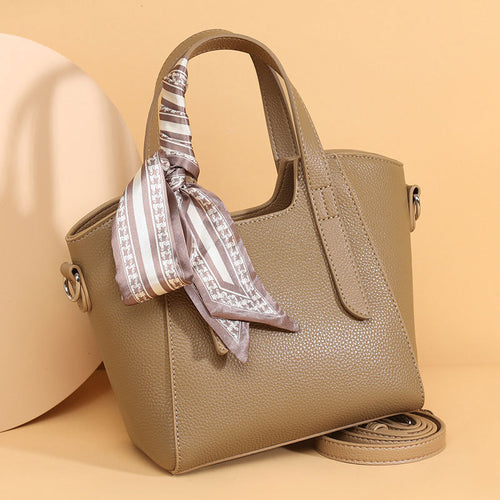 couro genuíno Bolsa de mão feminina Novo modelo fashion elegante Bolsa bucket elegante versátil para o dia a dia Bolsa de ombro feminina Internacional