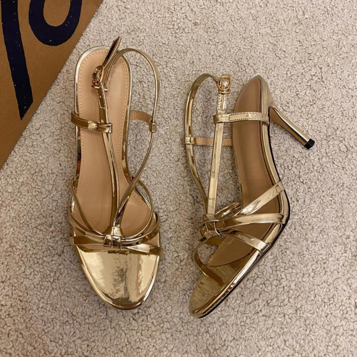 YX temperament celebrity gold strap high heels women's 2026 new one-line strap thin heel Roman sandals French temperament