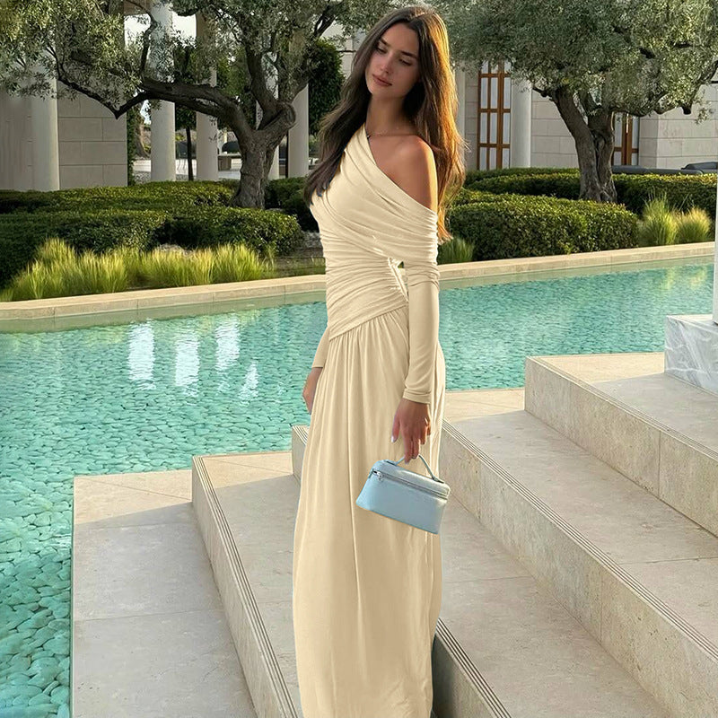 Cross-border wholesale European and American women's clothing autumn and winter new fashion solid color sexy diagonal collar pleated irregular long sleeve dress