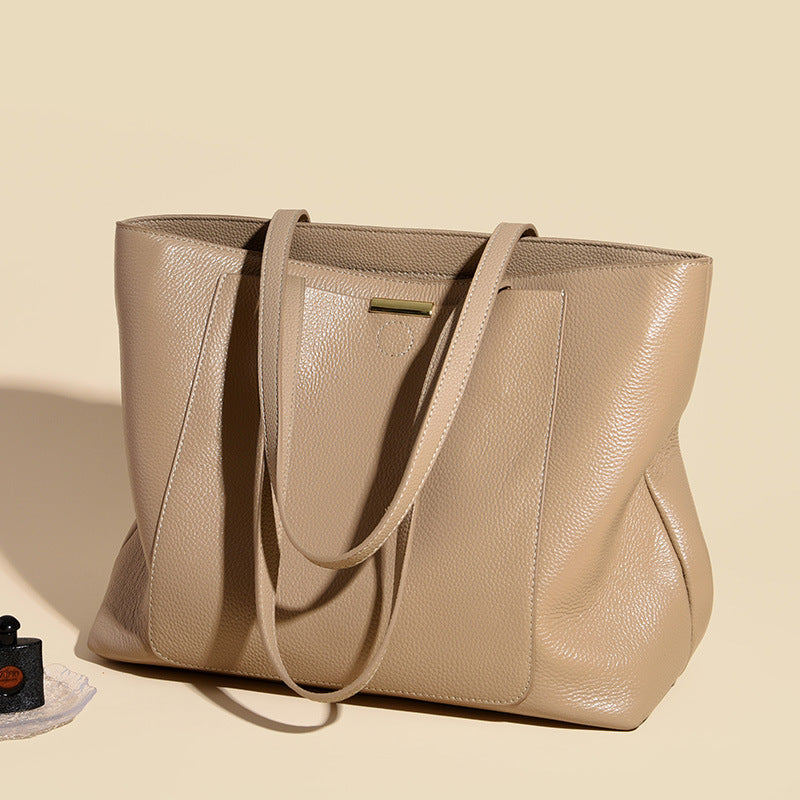 Internacional Bolsa tote minimalista fashion Bolsa de ombro feminina elegante Grande capacidade para o dia a dia bolsa de estilo descontraído couro macio Bolsa atacado
