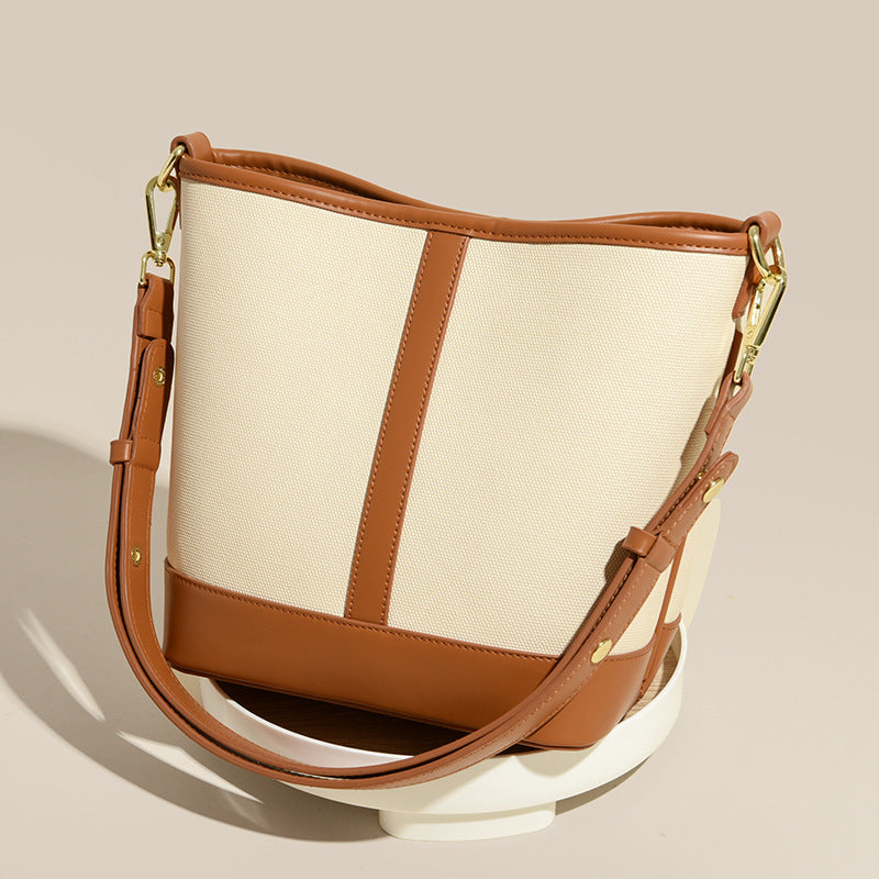 Bolsa bucket Internacional fashion versátil Bolsa transversal feminina contraste de cores Grande capacidade bolsa de mão elegante Bolsa de ombro feminina