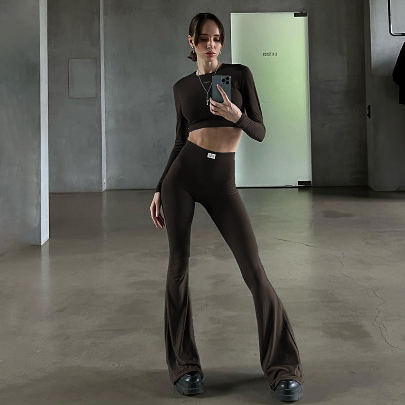 Cross-border European and beautiful clothing autumn and winter new temperament, solid color long-sleeved crop top, high-waisted loose bootcut pants, two-piece set