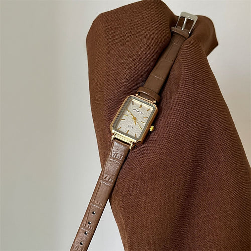 DOUKOU's new fashion hit light luxury student women's wristwatch, niche square watch, women's belt, cross-border