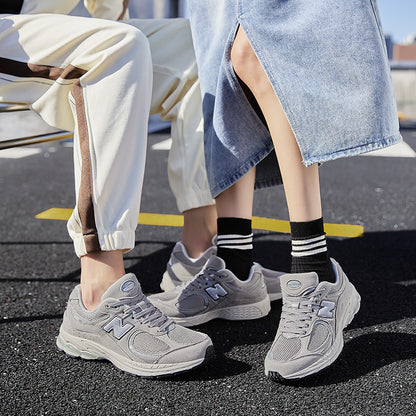 Tênis masculinos primavera e outono novo equilíbrio cool corrida Putian tênis de corrida 2002R retro casal versátil sapatos masculinos atacado mulheres
