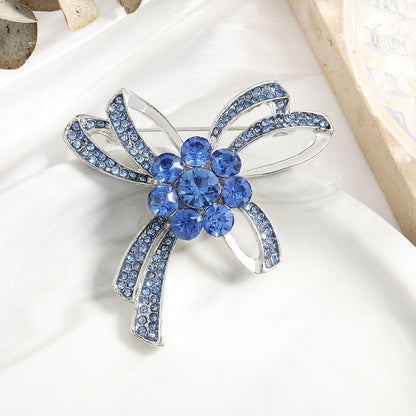 Fashionable Austrian blue crystal simple alloy bow brooch, high-end collar pin, silk scarf, fastener, garment decoration, corsage