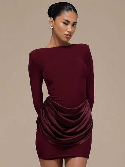 Foreign trade autumn and winter new European and beautiful clothing temperament solid color round neck long sleeve short pleated slim hip dress for women