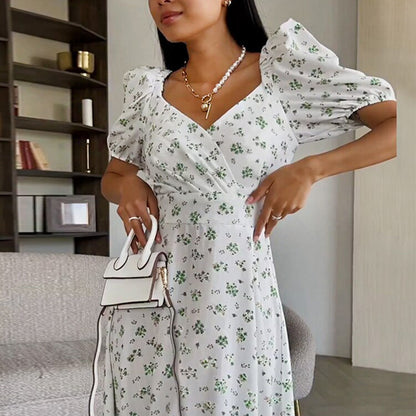 Dopamine outfit 2026 new European and American dress sexy V-neck puff sleeve French elegant floral dress