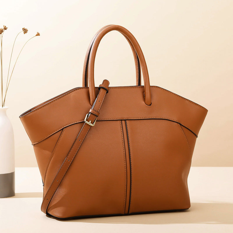 Novo modelo Bolsa tote couro macio elegante bolsa asa Grande capacidade para o dia a dia Bolsa de mão fashion versátil Bolsa tote Internacional