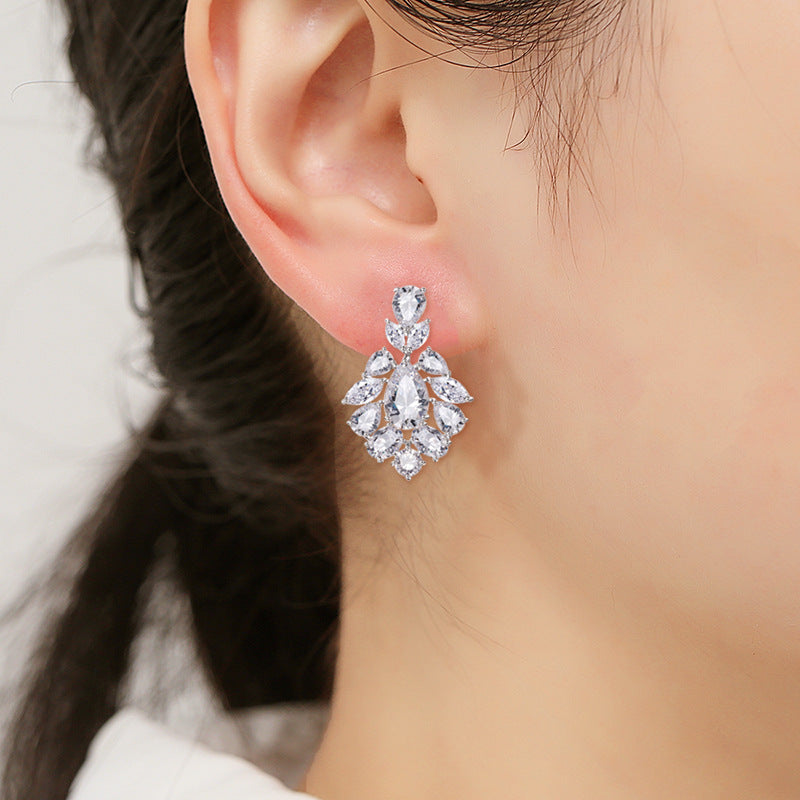 Cross-border hot waterdrop zircon stud earrings in multiple sizes with patchwork earrings, niche designs, light luxury banquet earrings wholesale