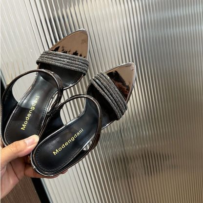 WO Huizhou City's 2026 autumn new one-line strap sandals, horseshoe heels, gun-colored high heels, fashionable European and aesthetic