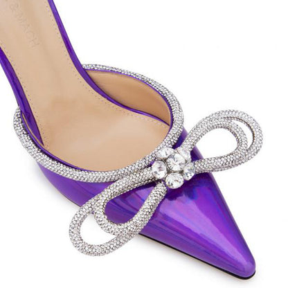 A kick of laser bow rhinestone high heel slippers, thin heels, pointed toe and half flip-flops, wearing a new European and American style
