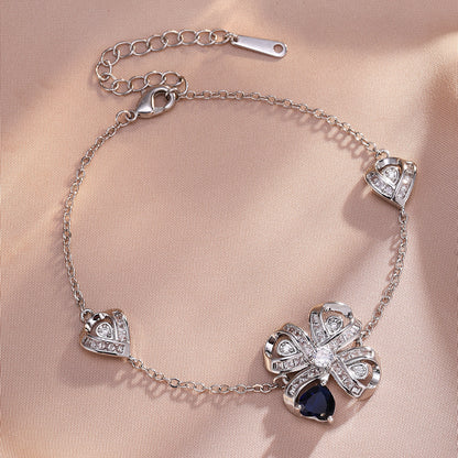 The new Baojiayong blooming flower bracelet plated with 18K gold floral blue diamond-set simple and sophisticated fashion women's set