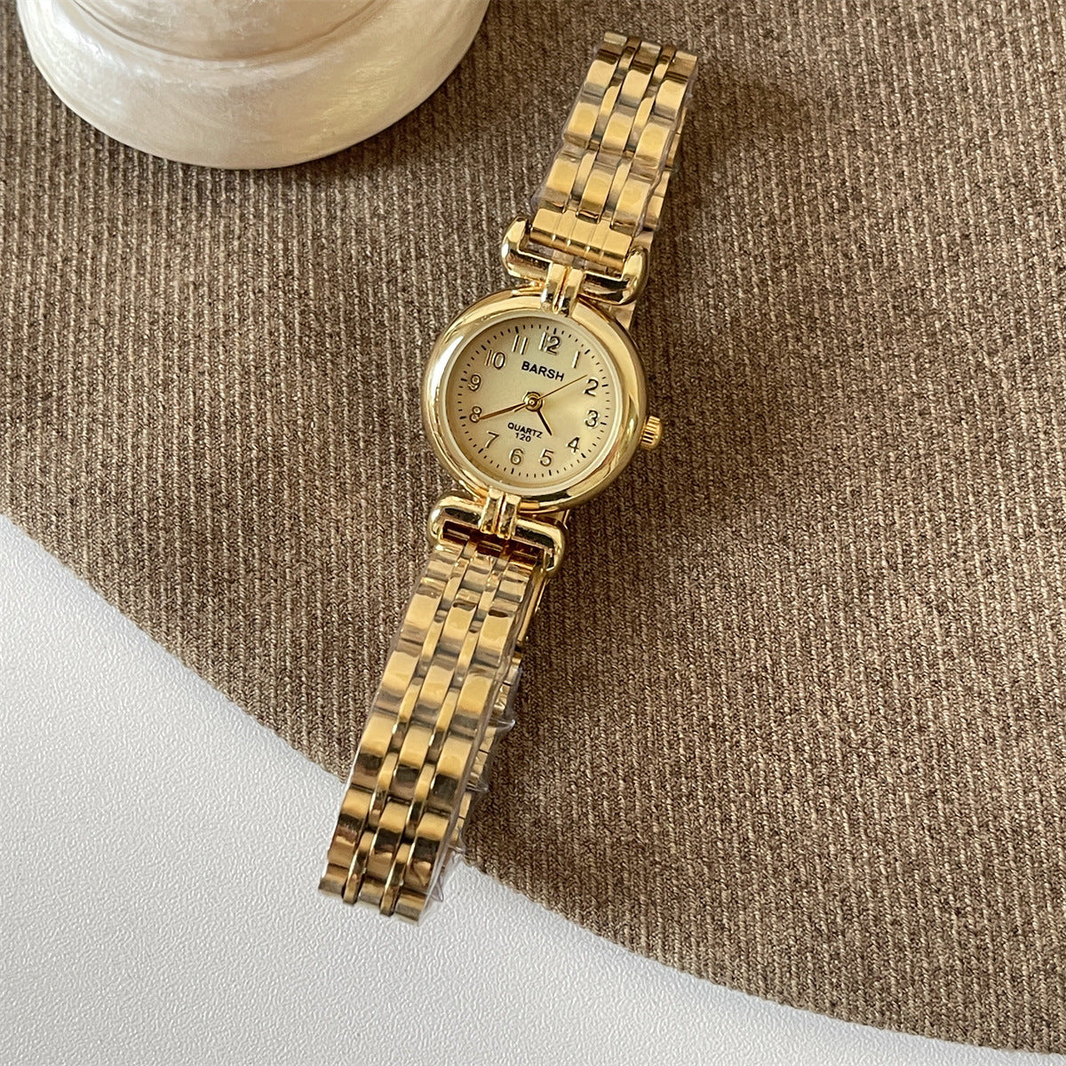 Foreign trade wholesale explosive second-hand women's quartz watch women's retro mini small disc niche light luxury steel belt