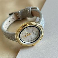 Gray with a gold rim and white finish