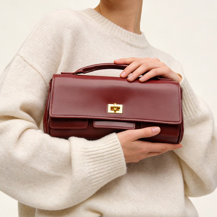 Bolsa de ombro feminina Novo modelo elegante fashion clutch minimalista acabamento sofisticado versátil Bolsa transversal para o dia a dia de ombro curta Bolsa