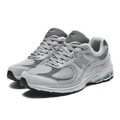 Tênis masculinos primavera e outono novo equilíbrio cool corrida Putian tênis de corrida 2002R retro casal versátil sapatos masculinos atacado mulheres