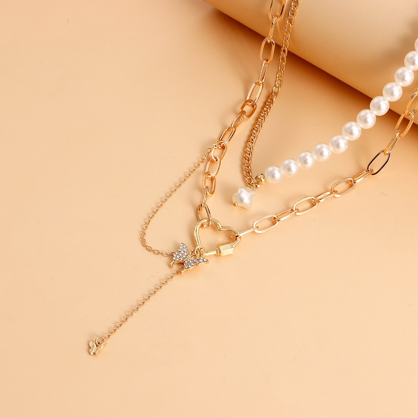 Pastoral Retro Geometric Love Butterfly Combo Necklace European and American French elegant imitation pearl beaded chain necklace