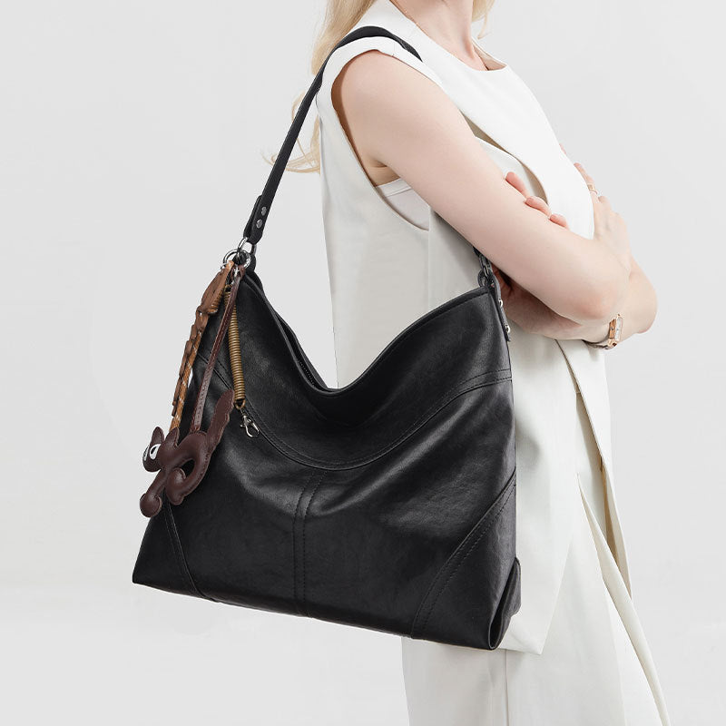 Internacional Bolsa tote Novo modelo 2026 versátil Bolsa minimalista casual Bolsa de ombro para o dia a dia Grande capacidade Bolsa tote atacado