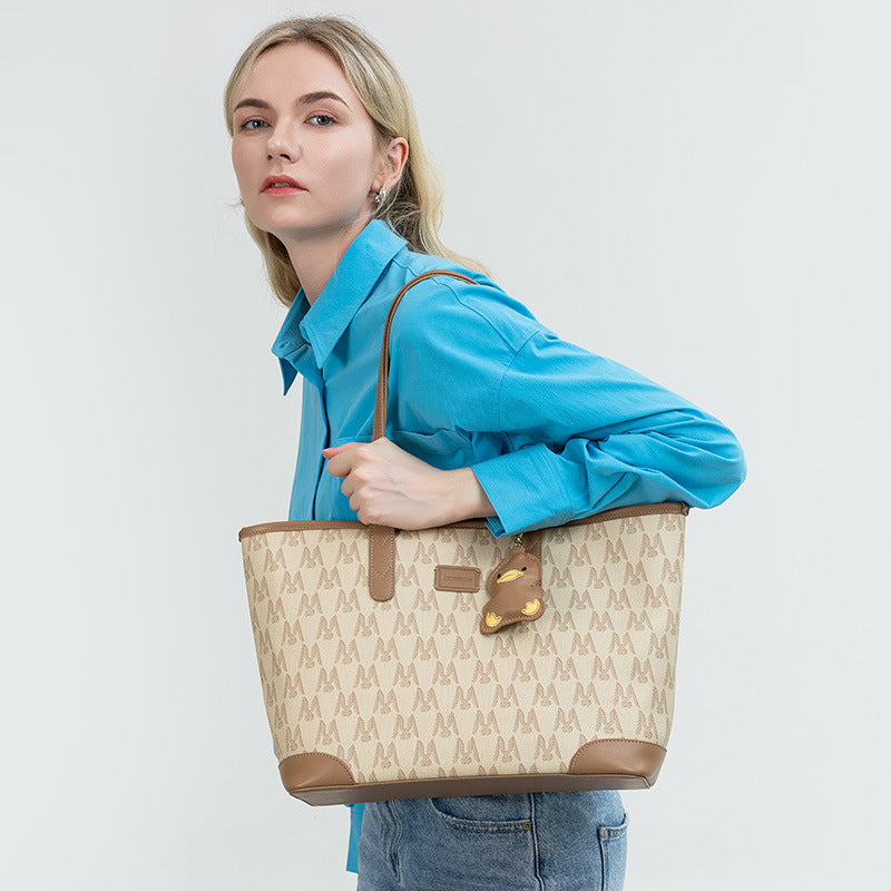 Internacional Bolsa tote Novo modelo elegante Bolsa fashion estampado Bolsa de ombro Grande capacidade versátil para o dia a dia bolsa atacado