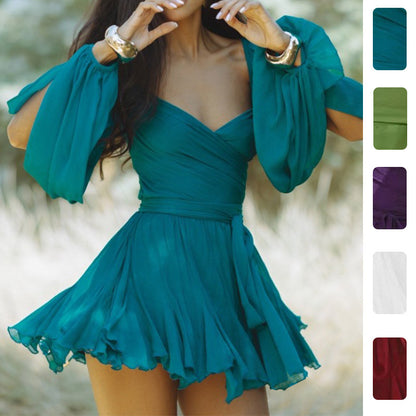 Vestido plissado sexy e elegante de cor sólida com decote em V, novo modelo europeu para a primavera de 2026, que emana charme e elegância.