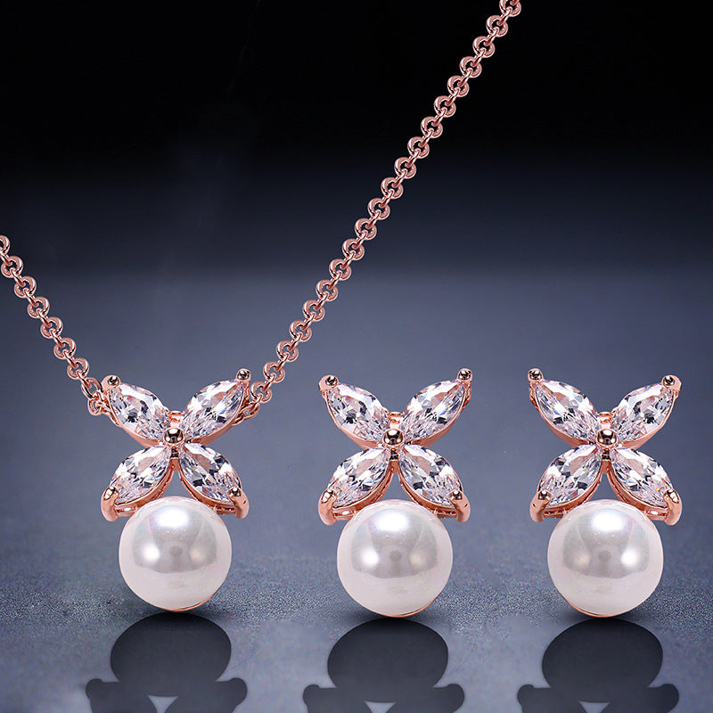 New French four-leaf clover pearl niche design, high-end sense of luxury, micro-inlaid zircon earrings, necklace set