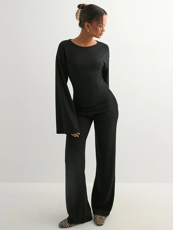 Conjunto de senhora outono/inverno com estampado transfronteiriço, composto por blusa de manga comprida com gola redonda, manga flare e calças à boca de sino.