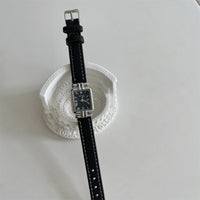 Black belt silver frame black face