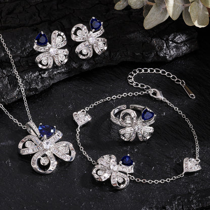 The new Baojiayong blooming flower bracelet plated with 18K gold floral blue diamond-set simple and sophisticated fashion women's set