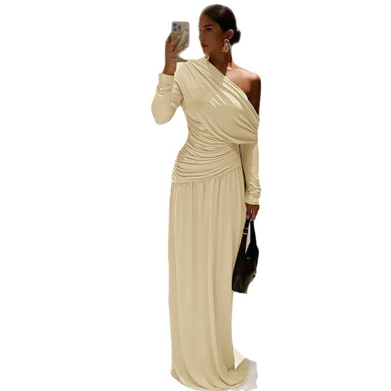 Cross-border wholesale European and American women's clothing autumn and winter new fashion solid color sexy diagonal collar pleated irregular long sleeve dress