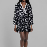 White flower on black