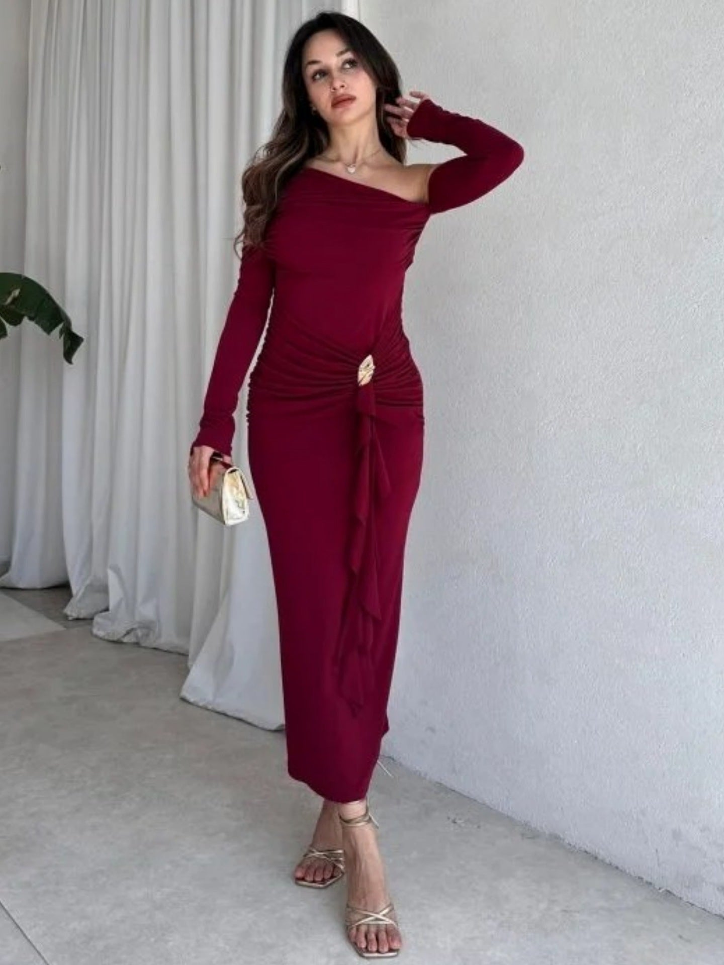 Cross-border autumn new European and American clothing temperament solid color diagonal collar one shoulder long sleeve waist streamer hip wrap dress for women