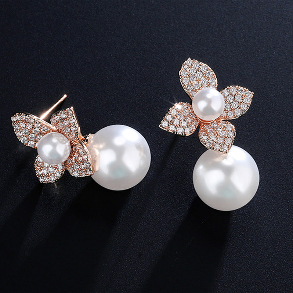 French niche design pearl earrings for women, high-end creative floral minimally inlaid zircon ear accessories for women