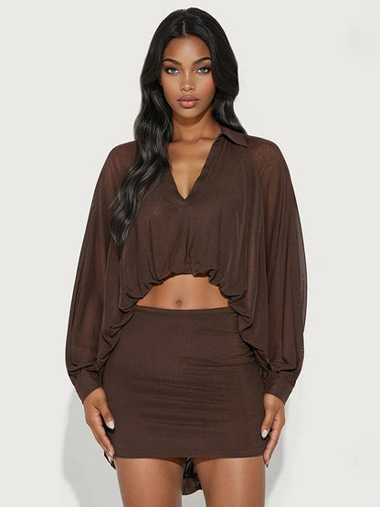 Foreign trade autumn and winter new European and beautiful clothing fashion solid color puff sleeve long sleeve top slim fit hip wrap shirt skirt set