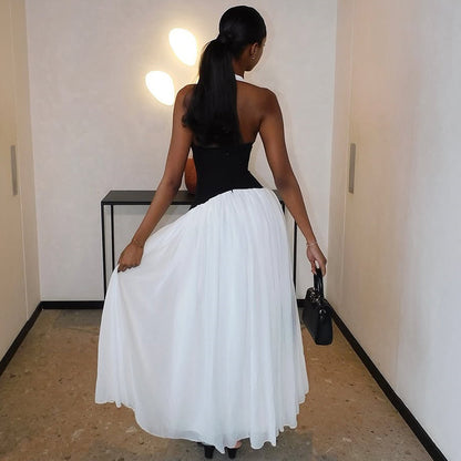 Foreign trade summer new European and beautiful clothing fashion contrast sexy deep V sleeveless halterneck waist swing dress for women