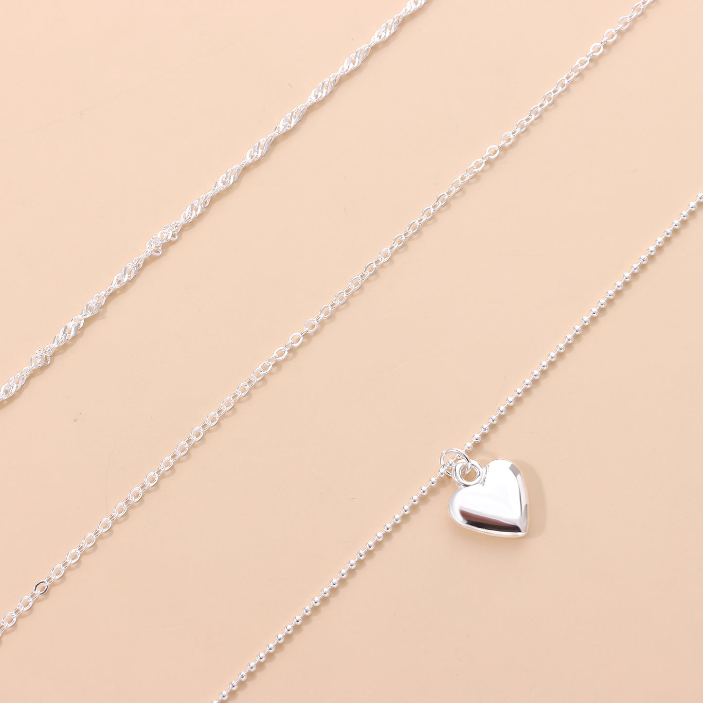 Cross-border jewelry level love pendant collar fashion women's twist chain peach heart clavicle chain source manufacturers