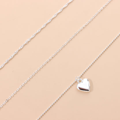 Cross-border jewelry level love pendant collar fashion women's twist chain peach heart clavicle chain source manufacturers
