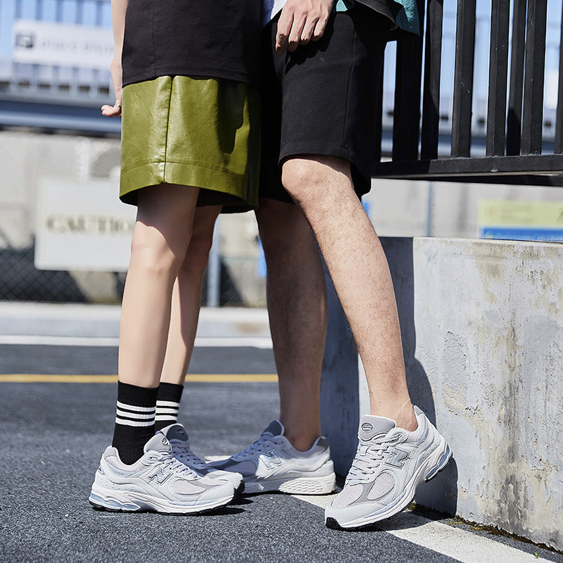 Tênis masculinos primavera e outono novo equilíbrio cool corrida Putian tênis de corrida 2002R retro casal versátil sapatos masculinos atacado mulheres