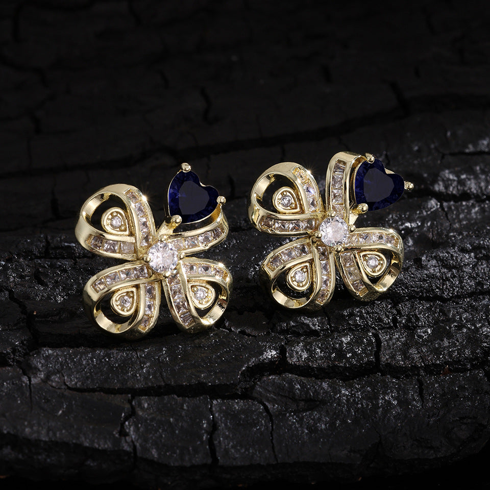 The new Baojiayong blooming flower bracelet plated with 18K gold floral blue diamond-set simple and sophisticated fashion women's set
