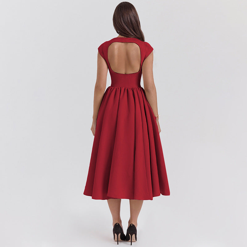 Foreign trade 2025 spring and summer new European and beautiful clothing temperament solid color crew neck open back slim waist slim swing dress for women