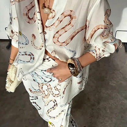 2026 foreign trade European and American new women's clothing elegant snake print shirt long sleeve slit skirt loose suit