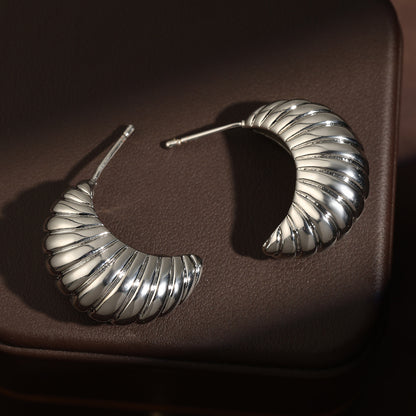 French vintage twisted C-shaped earrings, niche high-end commuting versatile copper-gilt silver earrings, cross-border jewelry wholesale