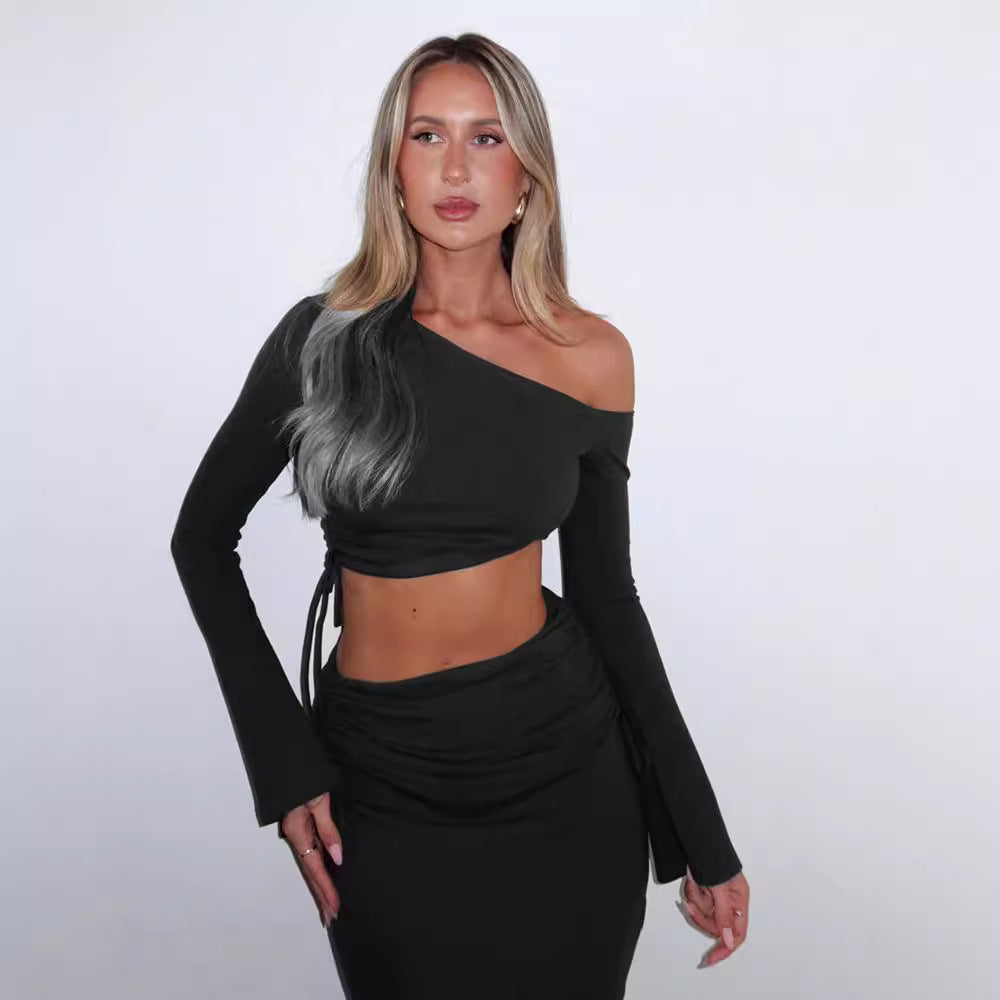 Cross-border European and American women's autumn and winter new temperament solid color one-shoulder crop top high-waisted slim skirt suit women