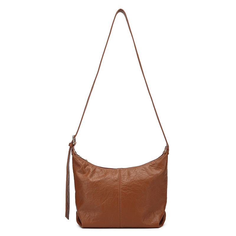 Bolsa de senhora 2025 nova tendência retro em pele macia, modelo dumpling, bolsa tote texturizada, bolsa de ombro a tiracolo.